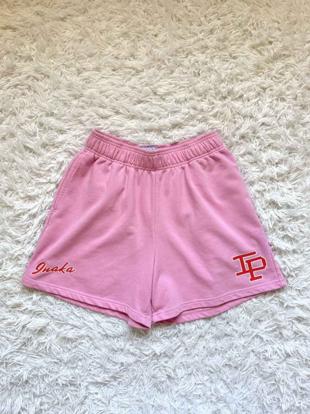 Inaka Power Pastel Pink Athletic Shorts with Red Accents